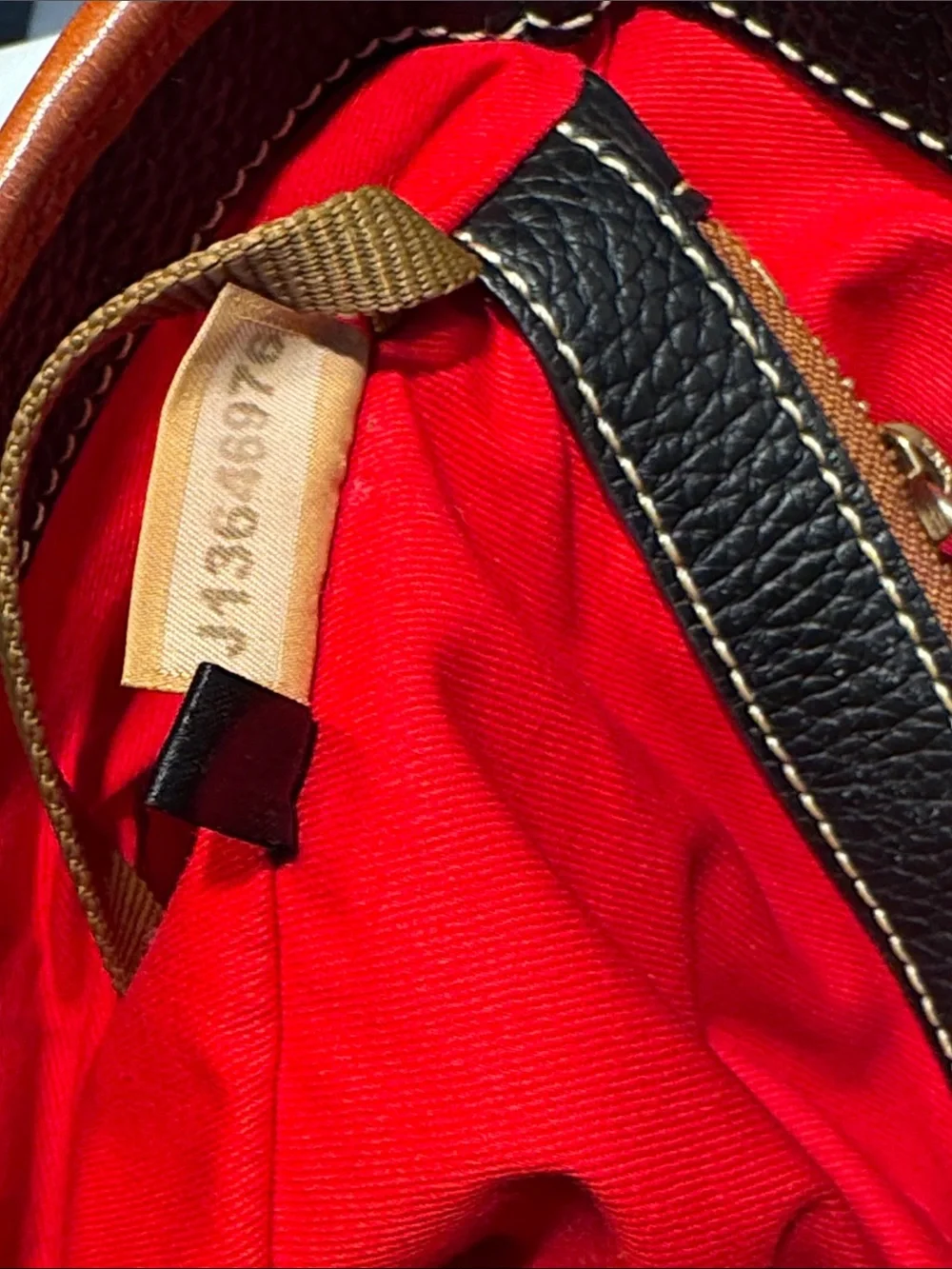 Dooney & Bourke Black Pebbled Leather Tote with Brown Trim & Handles